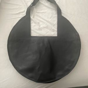 Luxurious new Xichtel triangle leather bag.  Dimensions are 10.5x20.